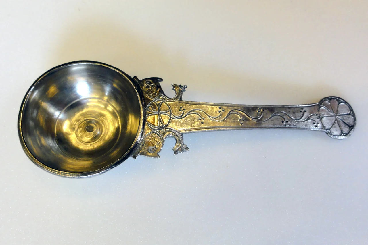 Silver-gilt ladle from the Hoxne Hoard  in the British Museum showing use of Christian symbol.