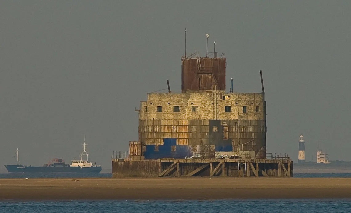 Haile Sand Fort, just off Cleethorpes, Lincolnshire, England.Passing ship and Spurn Point in the background.