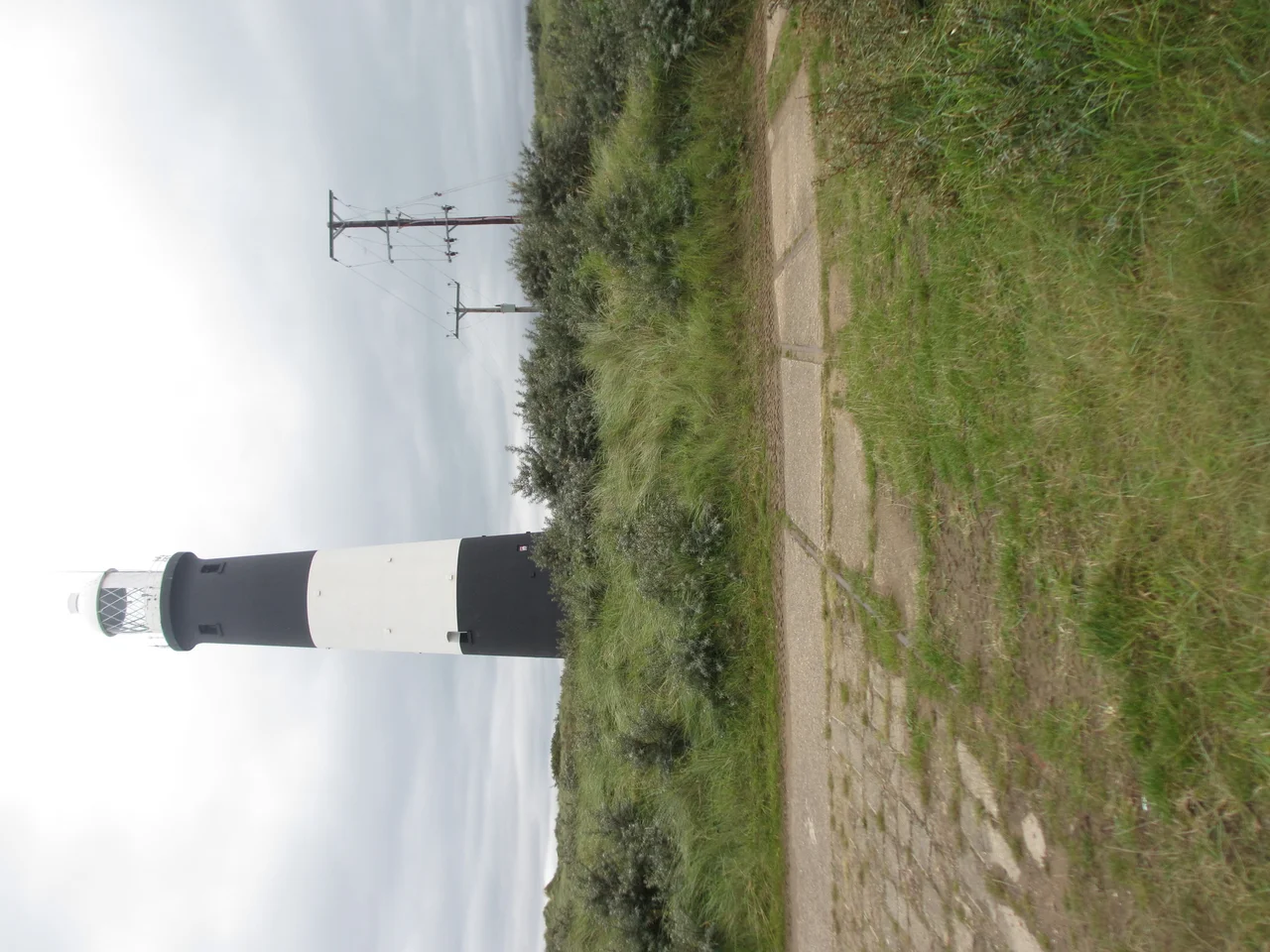 Spurn Head railway track embedded in concrete near the lighthouse in 2017, 66 years after closure.