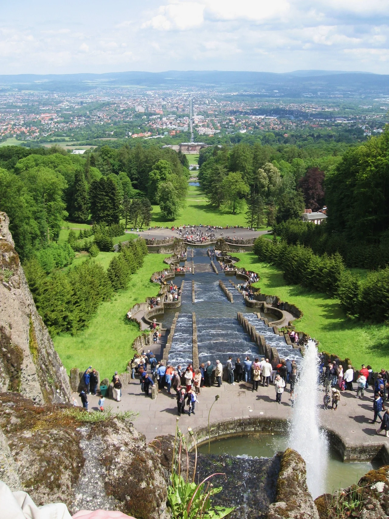 Germany / North Hesse / Kassel / View from the Bergpark Wilhelmshöhe (mountain park) to Kassel. The Baroque Water feature are operate. In background the castle Wilhelmshöhe and street "Wilhelmshöher Allee" to city.