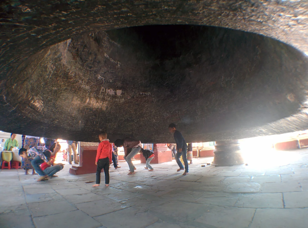 Children under Mingun Bell, showing graffiti as of December 2014