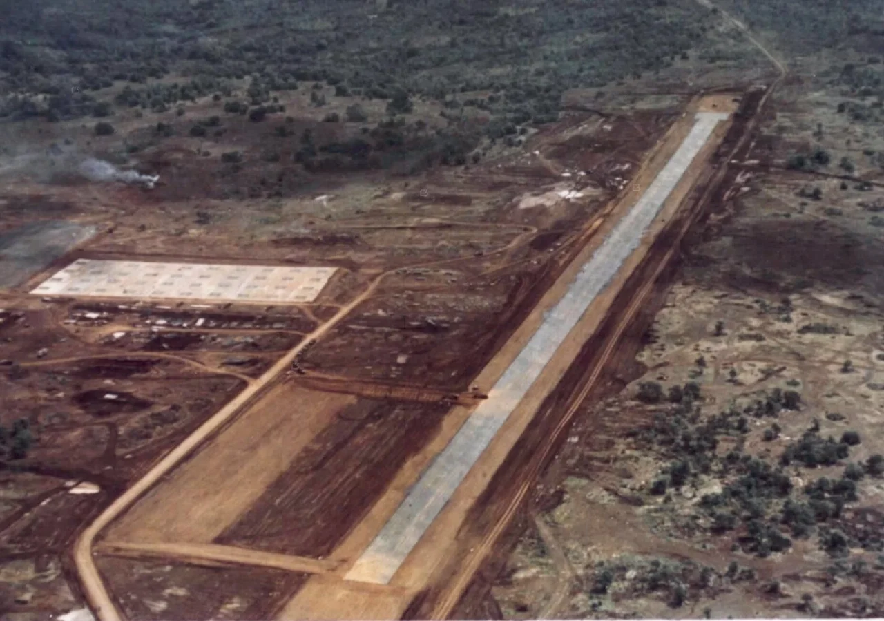 Aerial view of Landing Zone Oasis which is being used by a brigade of the 4th Infantry Division during Operation Francis Marion in western Pleiku province. Company B, 35th Engineer Battalion has upgraded the landing zone and constructed a 40 pad heliport.