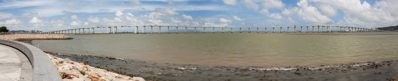 Panoramic view of the 4.7 km long Ponte de Amizade (Friendship Bridge) from the Macau Peninsula (left) to the Taipa Island (right), Macau.