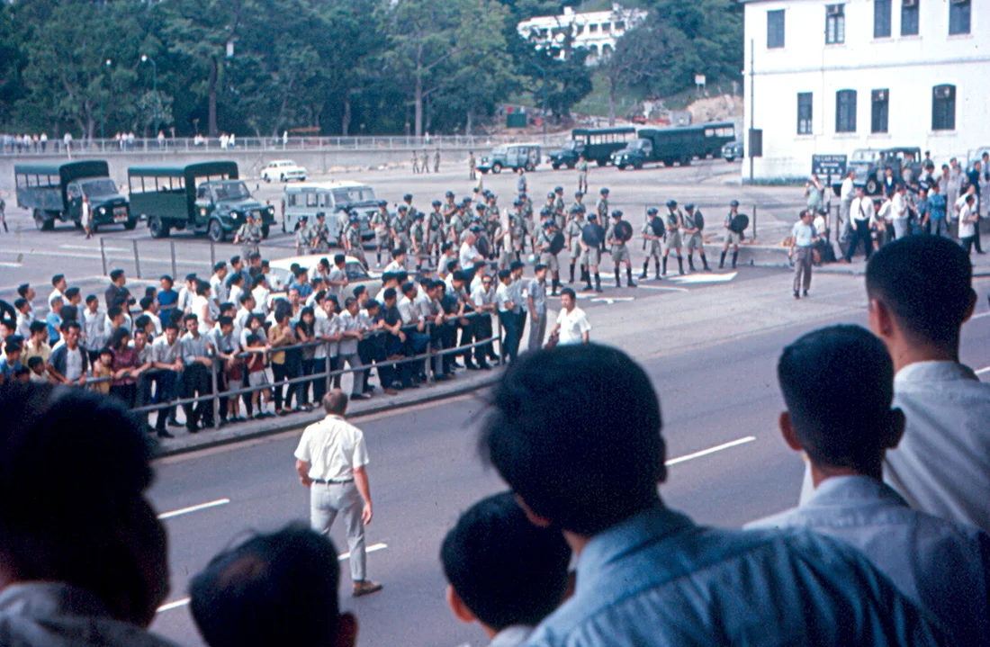 Confrontation between the Hong Kong Police and rioters in Hong Kong, 1967.