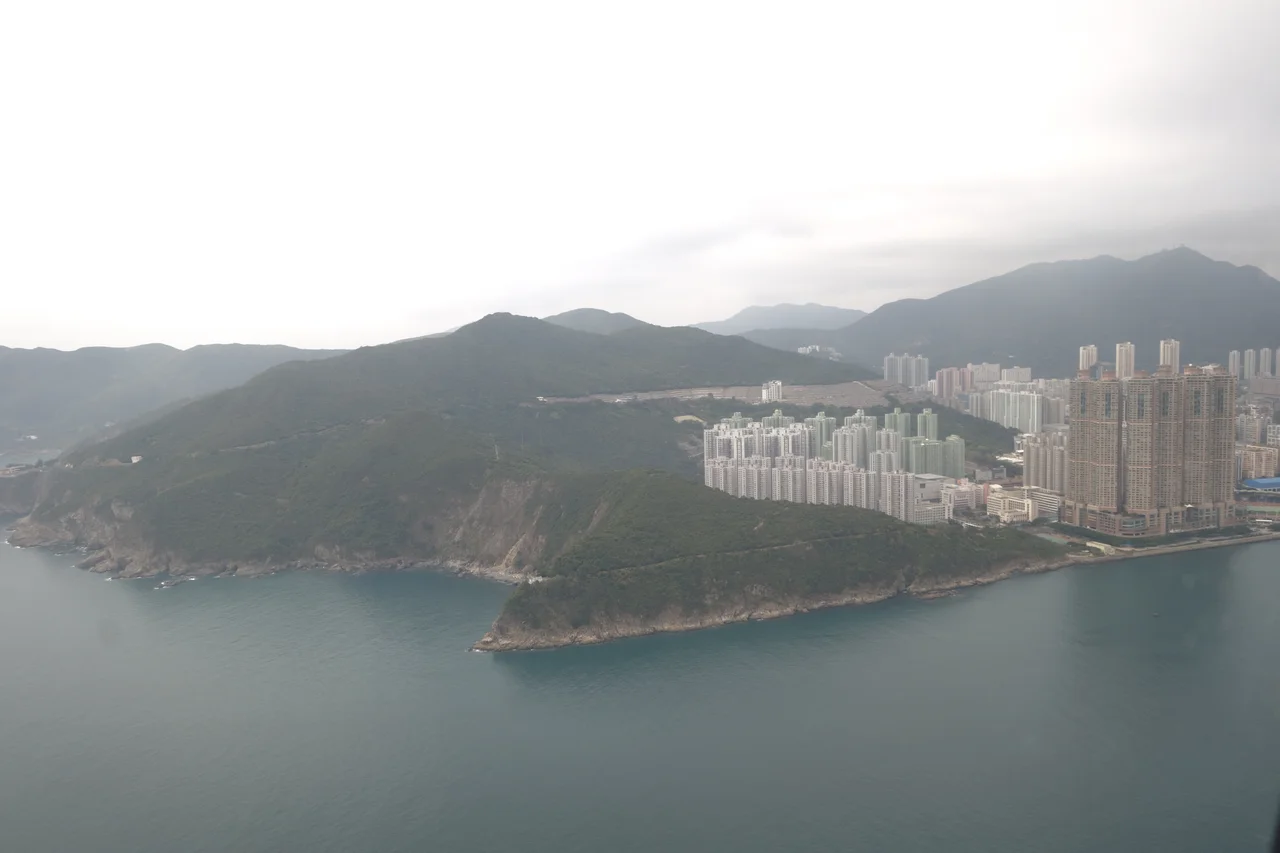Aerial view of Siu Sai Wan from the Northeast, Island Resort (Hong Kong), Fullview Garden, Siu Sai Wan Estate and Cape Collinson are featured in the photograph.