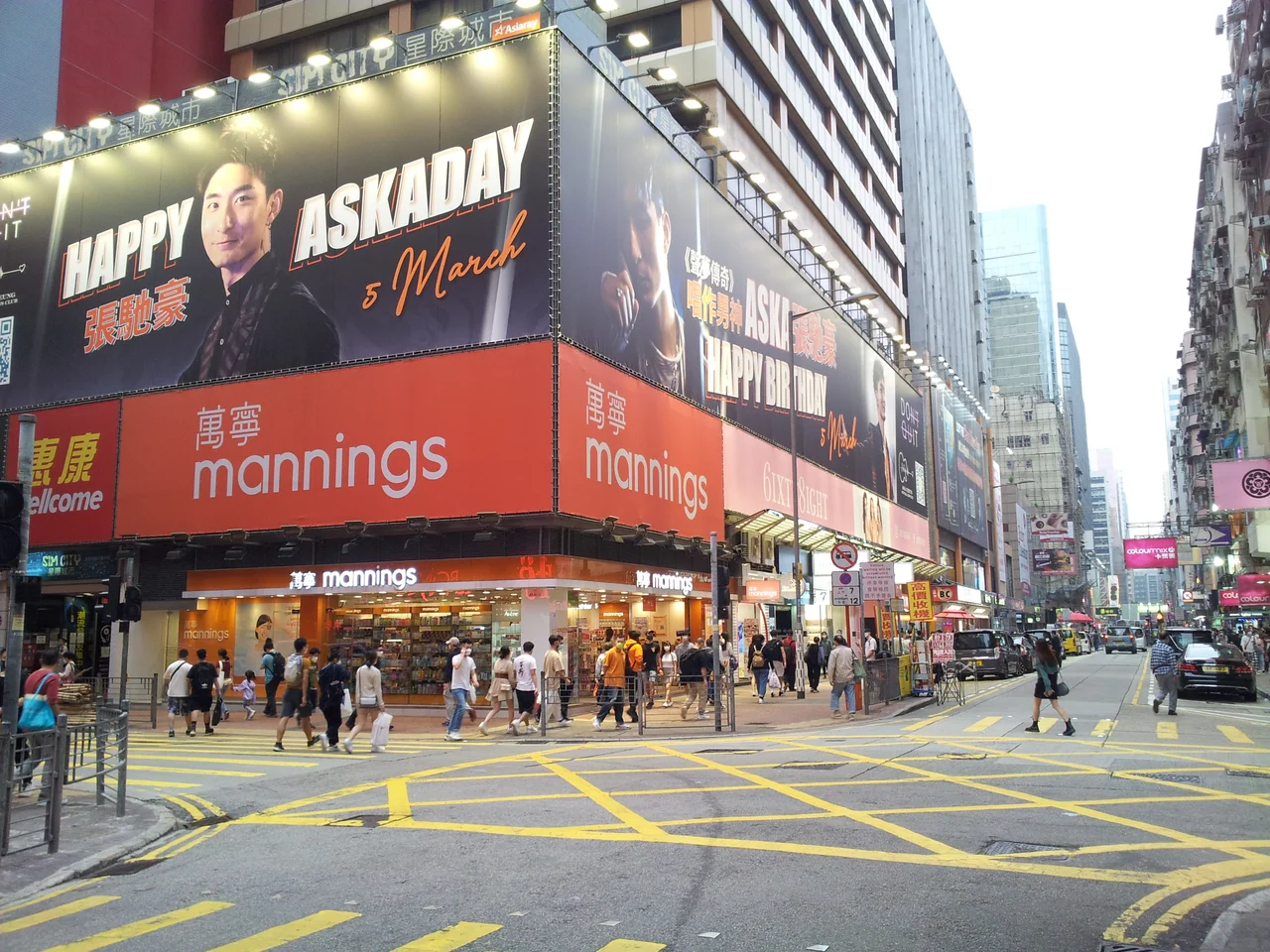 Street view outside Chung Kiu Commercial Building (Sim City) on Shantung Street/Sai Yeung Choi Street South junction in Mong Kong, Hong Kong.