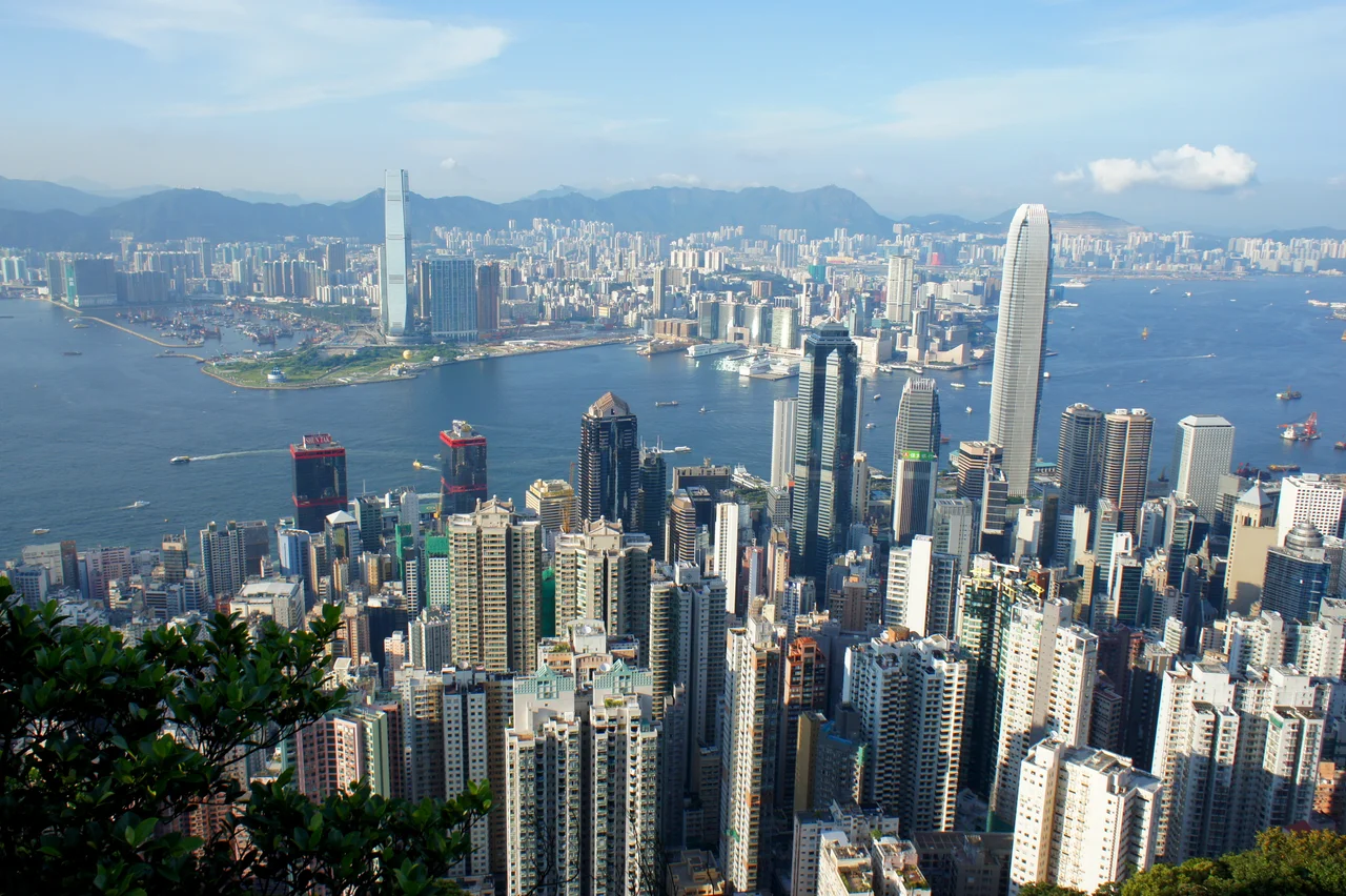 View of the Victoria Harbour from the Victoria Peak. The 'Victoria Harbour Gateway' formed by the Two International Finance Centre and International Commerce Centre on the opposite shore can clearly be seen.