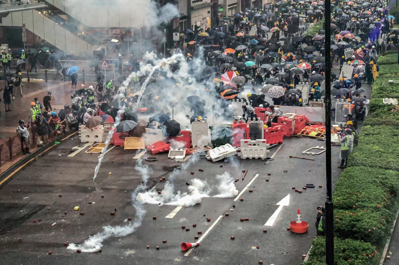 Standoff between protesters and the police at Yeung Uk Road