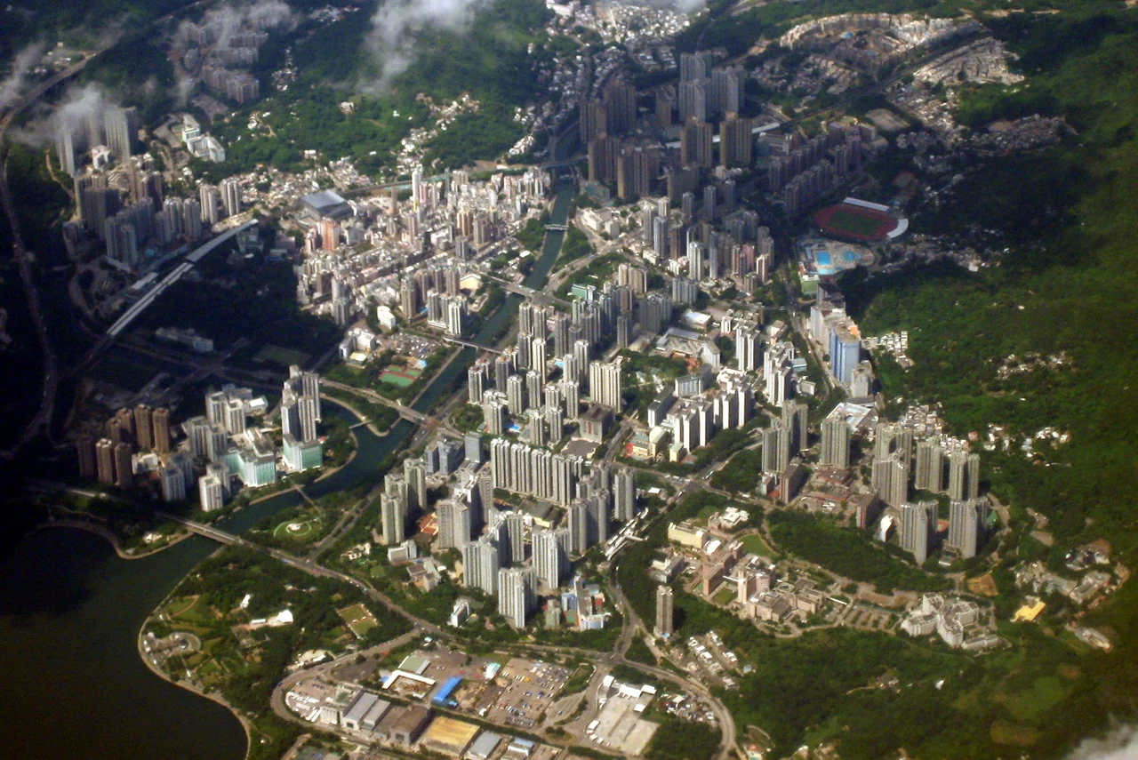 The view of Tai Po New Town, taken from a Airbus A340 during departure.