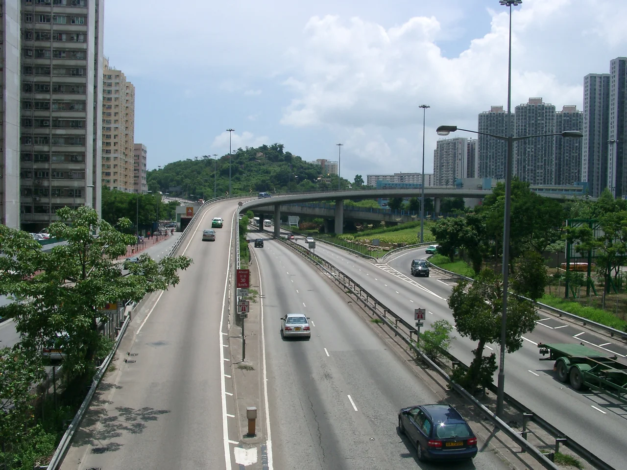 Junction of en:Tuen Mun Road and en:Wong Chu Road in en:Tuen Mun, en:Hong Kong.
The roads on the from the left to the right are:

Tsing Hoi Circuit (not directly connected to Tuen Mun Road)
Slip road from Tuen Mun Road southbound to Wong Chu Road westbound
Tuen Mun Road southbound
Tuen Mun Road northbound
Slip road from Wong Chu Road eastbound to Tuen Mun Road northbound