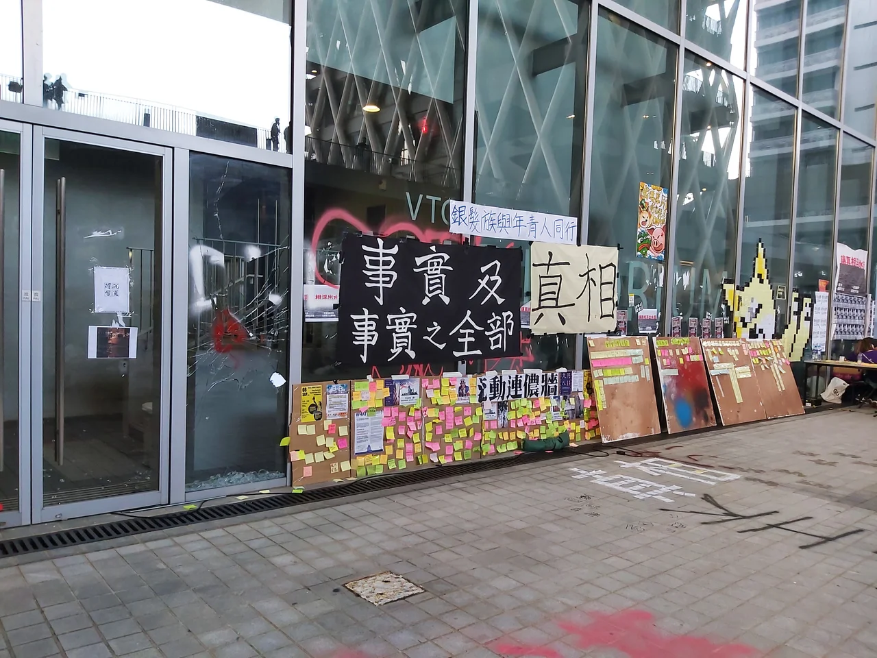 "Moveable Lennon Wall" which shows post-its demanding truth of the death of Chan Yin-lam, outside Vocational Training Council's institution Hong Kong Design Institute, in Tseung Kwan O, Hong Kong