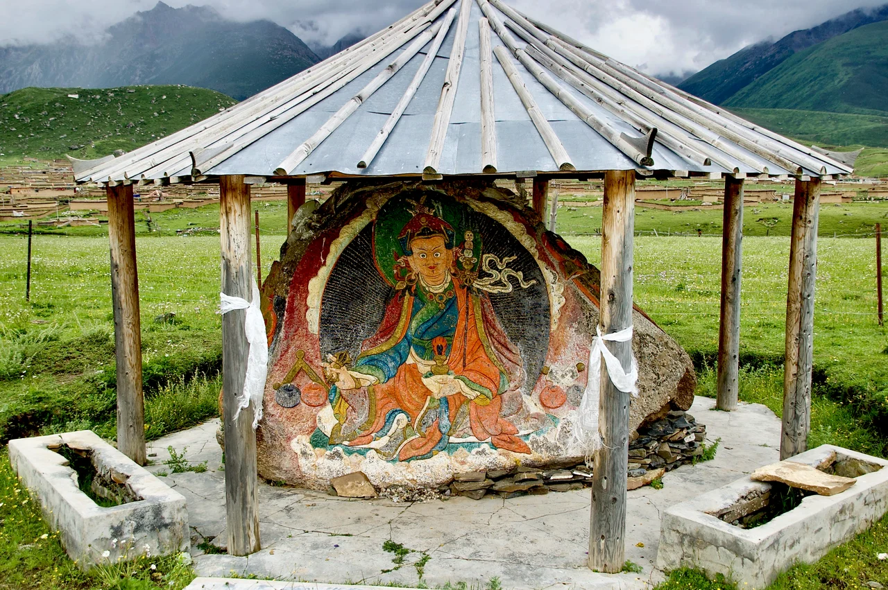 Image of Guru Rinpoche welcoming pilgrims and visitors on the road to Dzogchen Monastery, Sichuan, 2009