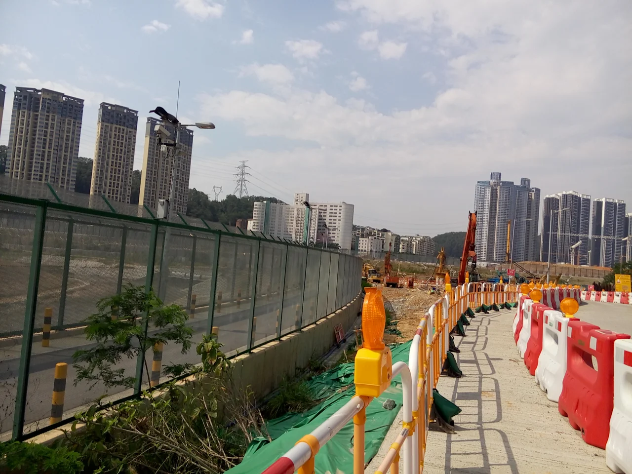 i.e. Shenzhen, mainland China as viewed from Hong Kong SAR. Now the Frontier Closed Area is really just a small police patrol road in the foreground.