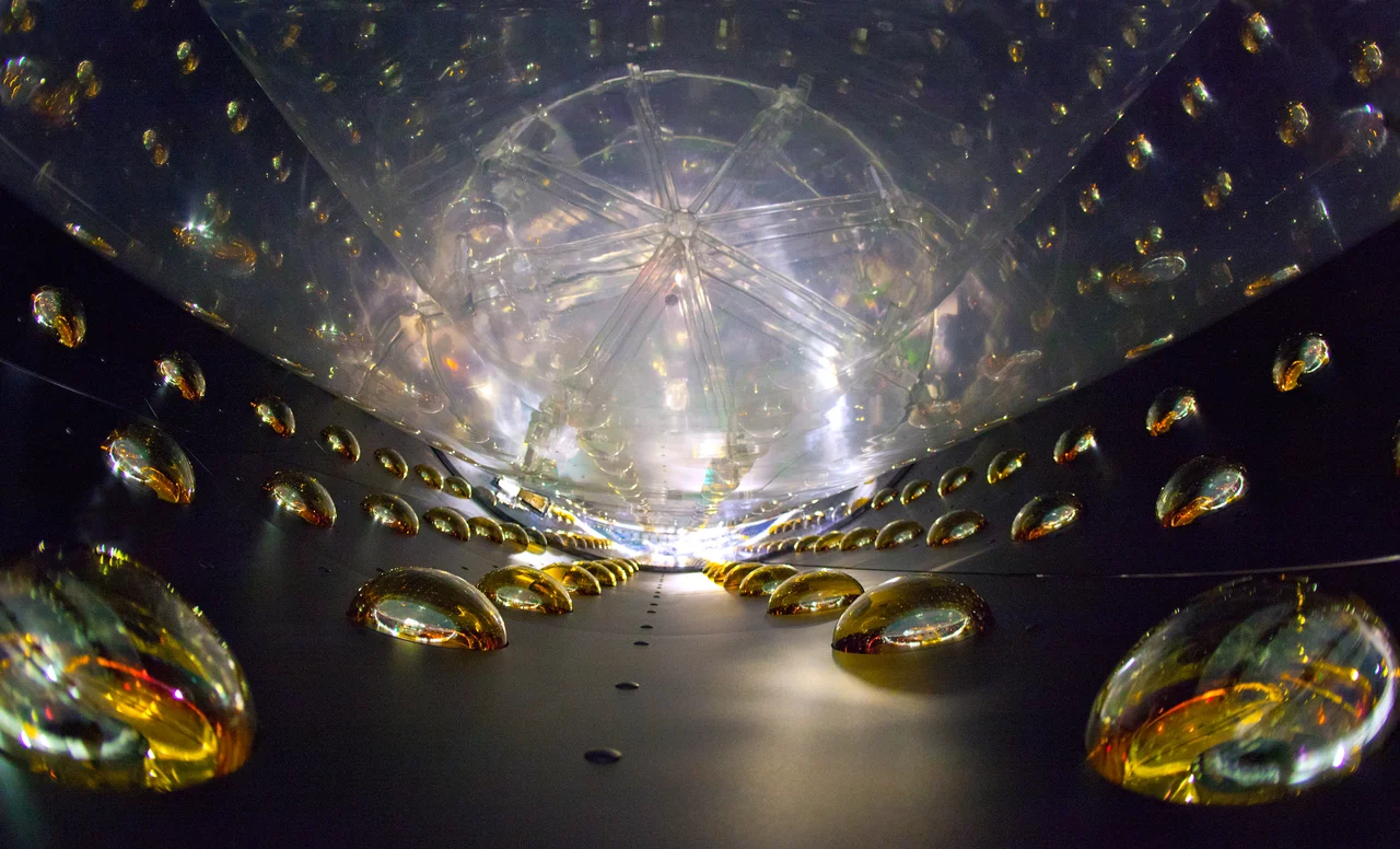 While they might look like drops of water or soap bubbles, these colorful figures are actually photomultiplier tubes that line the walls of the Daya Bay neutrino detector. Neutrinos and antineutrinos are neutral particles produced in nuclear beta decay when neutrons turn into protons. This experiment aims to measure the final unknown mixing angle that describes how neutrinos oscillate. The tubes are designed to amplify and record the faint flashes of light that signify an antineutrino interaction. Lawrence Berkeley and Brookhaven National Labs and a number of physicists at U.S. universities played leading roles in the Daya Bay experiment, from designing the detectors all the way through to analyzing the data gathered.