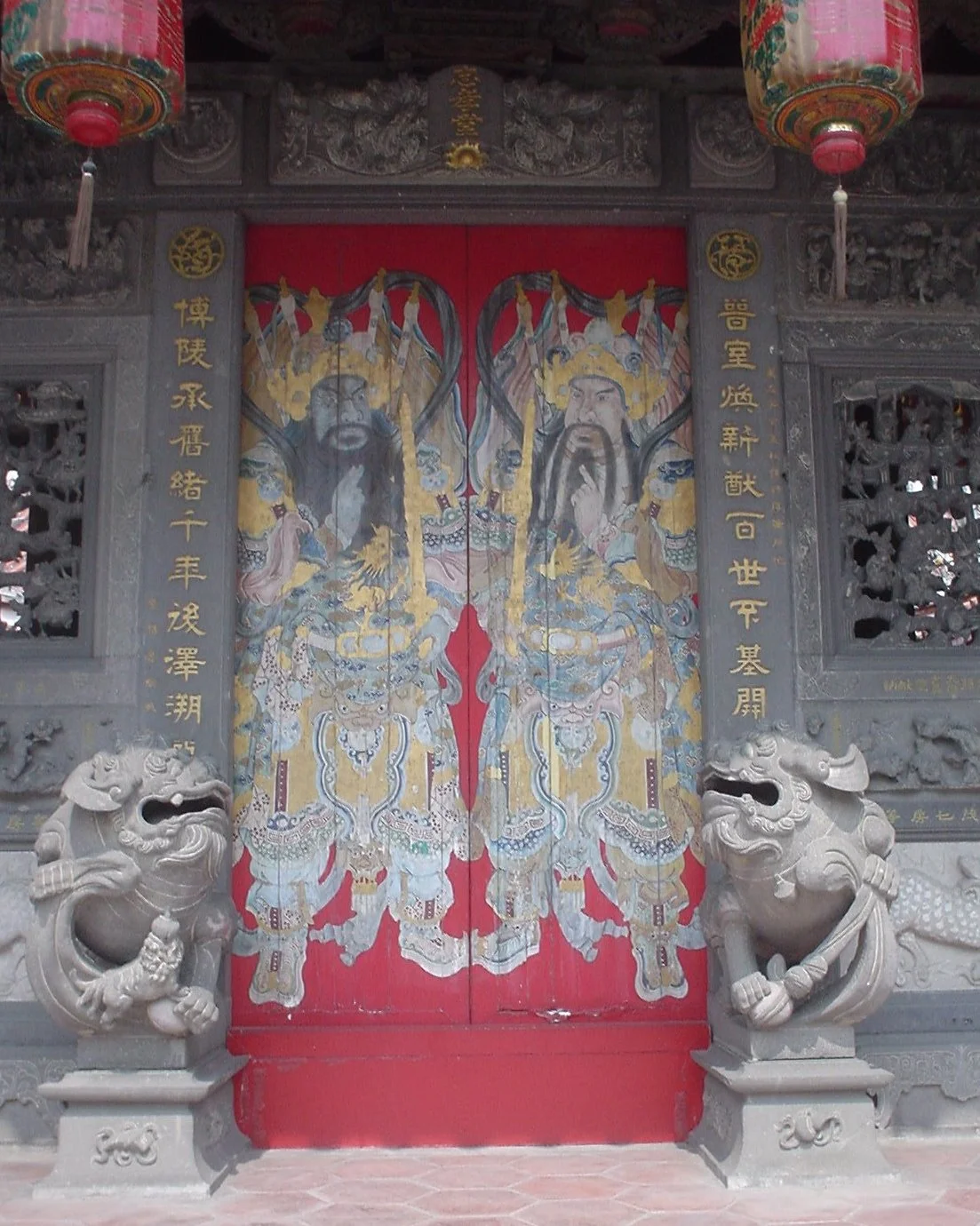This is a painting on the inside of the door looking from the inner courtyard exit to the outer courtyard at the Lin Family Temple in Taichung, Taiwan. Photo taken on October 12, 2006.