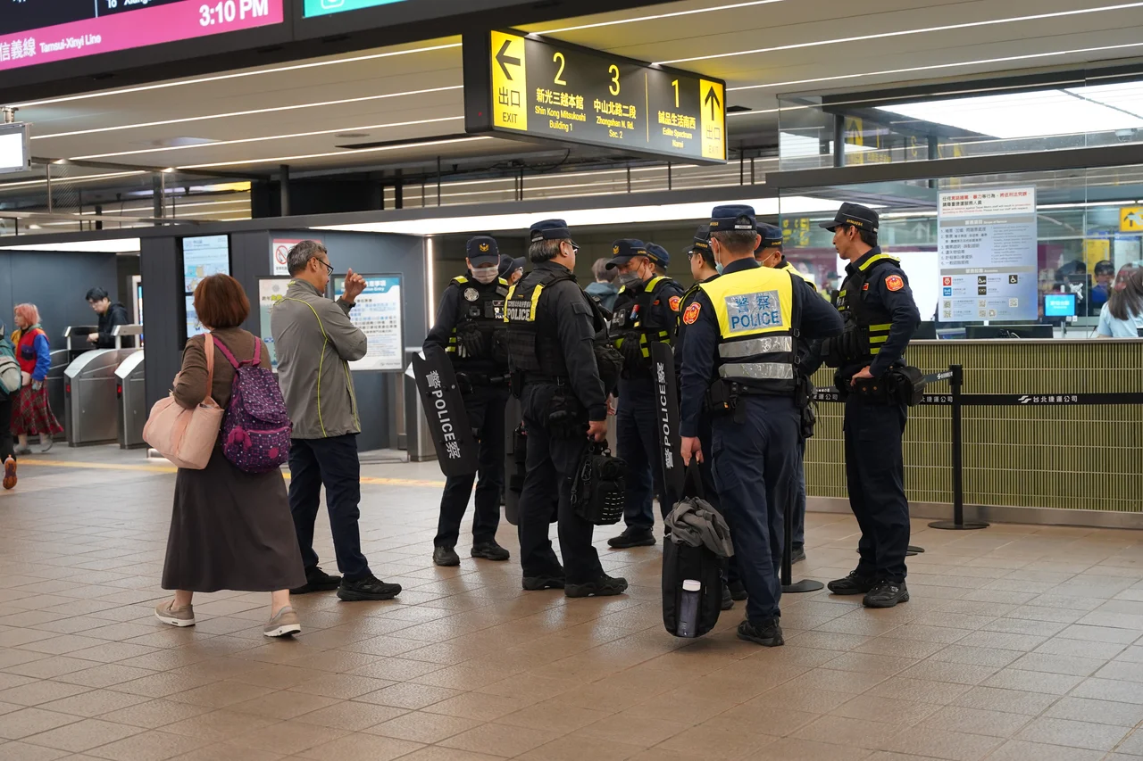 Heightened police patrol activity at Zhongshan metro station three days after the 2025 Taipei stabbings.